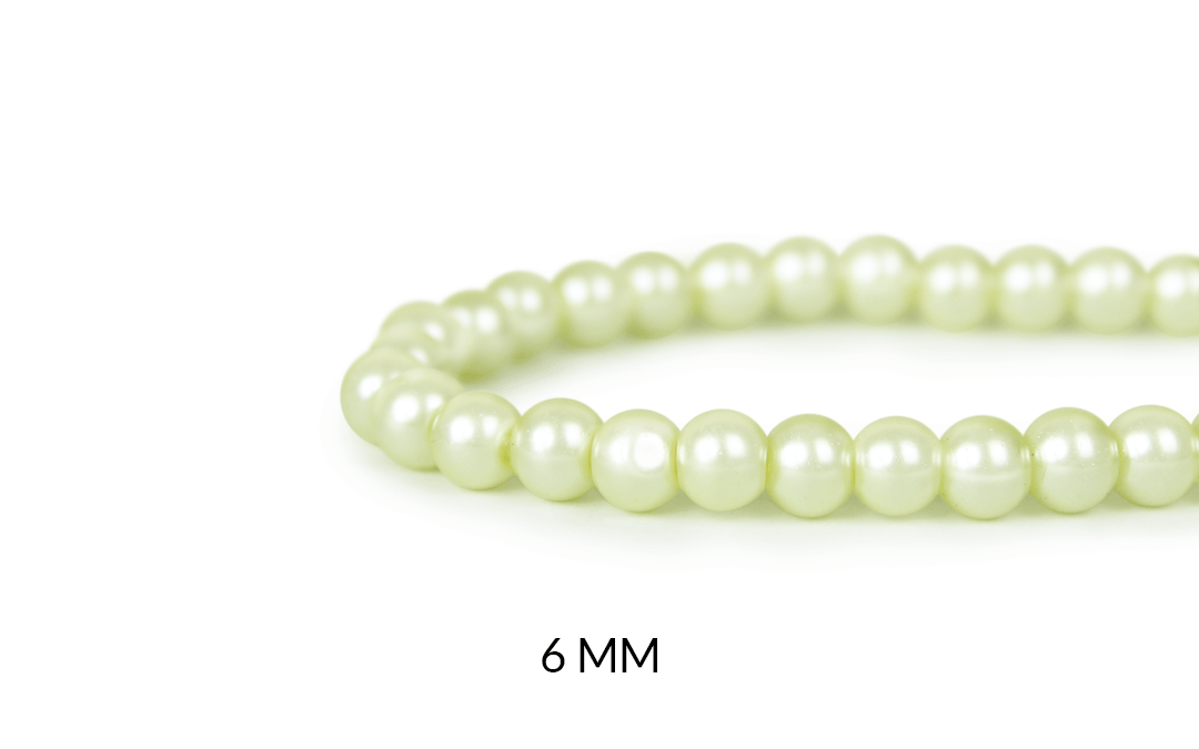 Perla de vidrio redonda amarillo crema 6mm x sarta