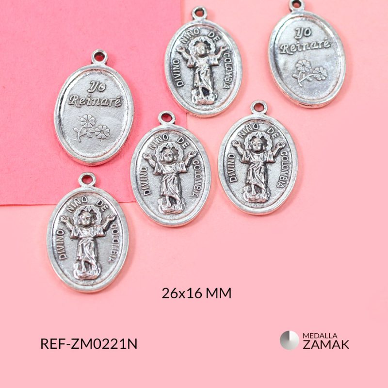 Medalla zamak ovalada Divino Niño de Jesús 26x16mm / paquete x 6 unidades / Ref-ZM0221N / Ref-ZM0221N