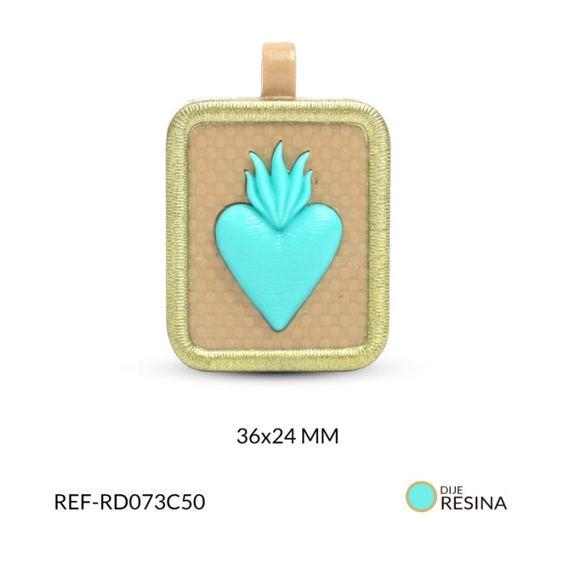 Dije resina sagrado corazón turquesa 36x24mm x und