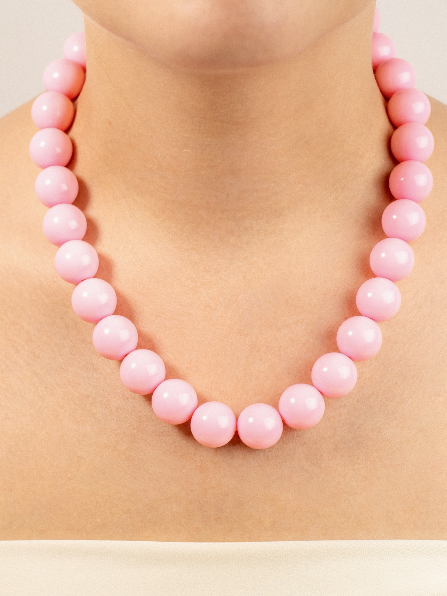 Collar terminado abaco color rosado x und